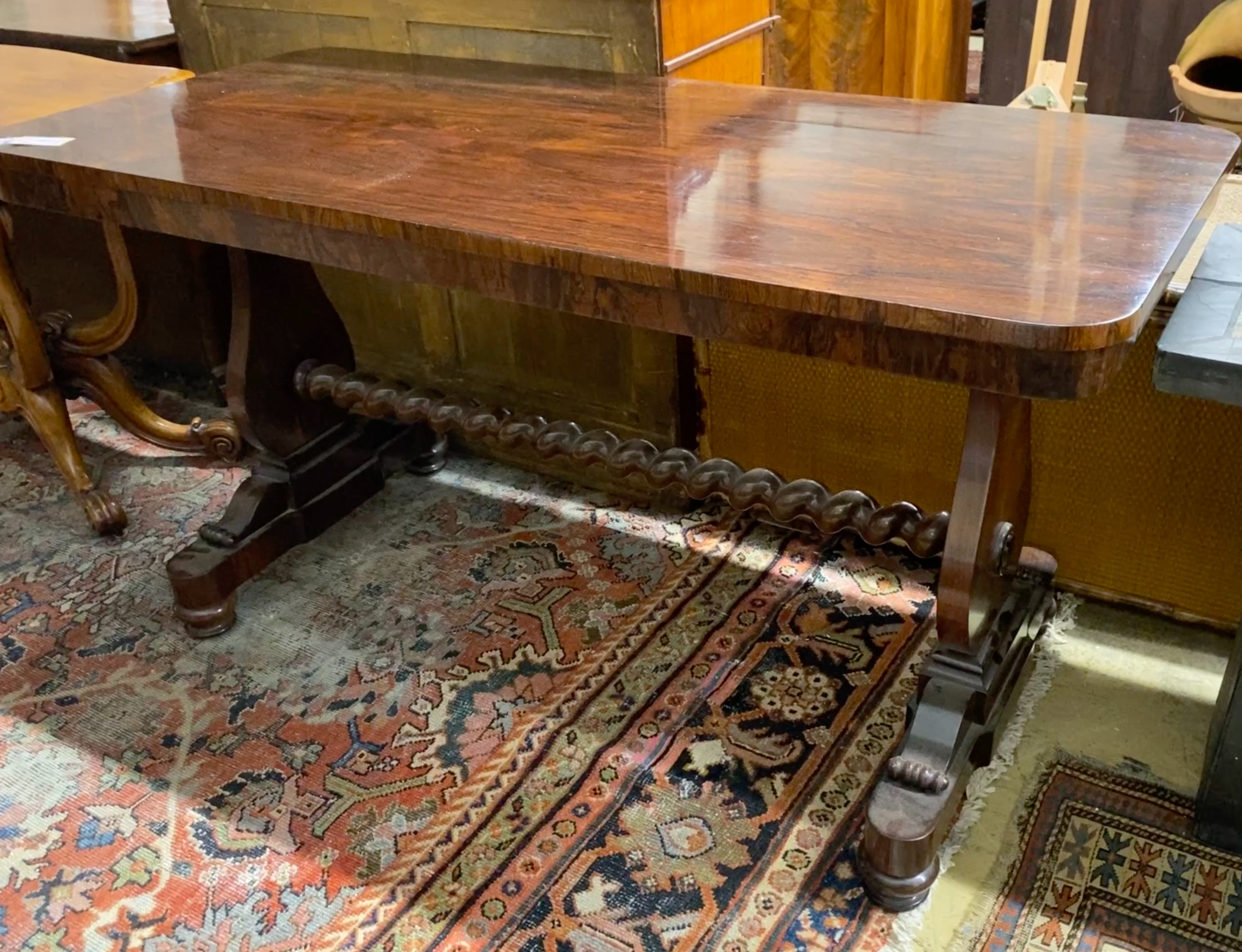 A late Regency rectangular rosewood centre table with spiral turned centre stretcher, width 147cm, depth 66cm, height 76cm